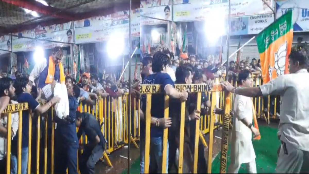 मंच तक पहुंचे करनी पड़ी मशक्कत, VIDEO: ​​​बैरिकेड्स कूदे वीडी शर्मा, सिंधिया को हाथ पकड़कर नेताओं ने चढ़ाया