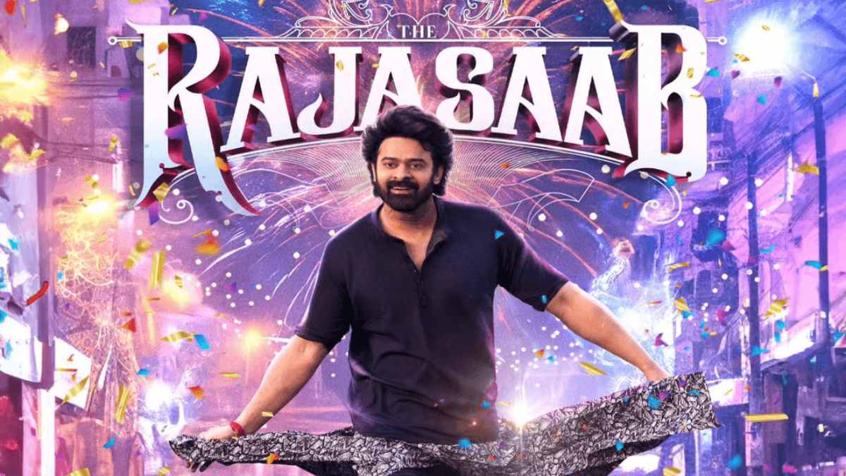 The Raja Saab :  प्रभास की ‘ द राजा साहब’ का फर्स्ट लुक आया सामने, लूंगी में नजर आया किलर लुक