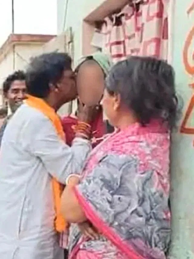 बीजेपी प्रत्याशी ने लड़की को किया Kiss, मचा बवाल