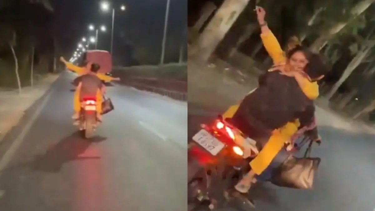 Couple Kissing Video : इश्क का ऐसा खुमार… चलती बाइक पर रोमांस करने लगा कपल, वीडियो वायरल