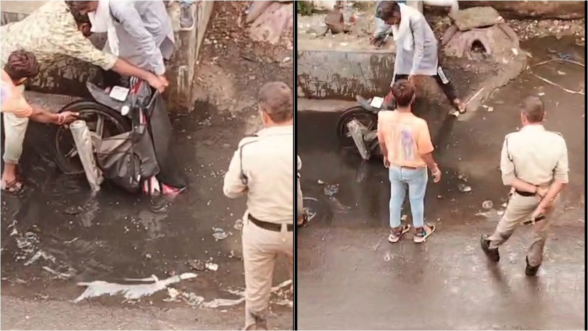 भोपाल में पानी से भरा सड़क, गड्ढे में गिरा पुलिसकर्मी, देखें हैरान करने वाला Video
