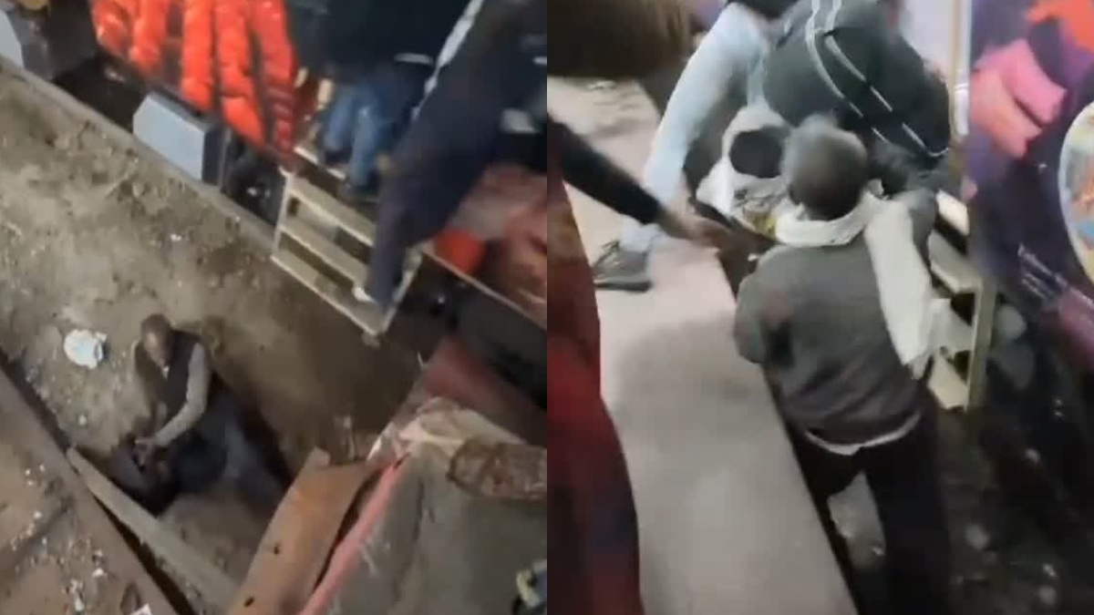 झांसी रेलवे स्टेशन : कुंभ जाने वाले यात्रियों में मची भगदड़, ट्रेन के नीचे आने से बचे कई यात्री, VIDEO हुआ वायरल