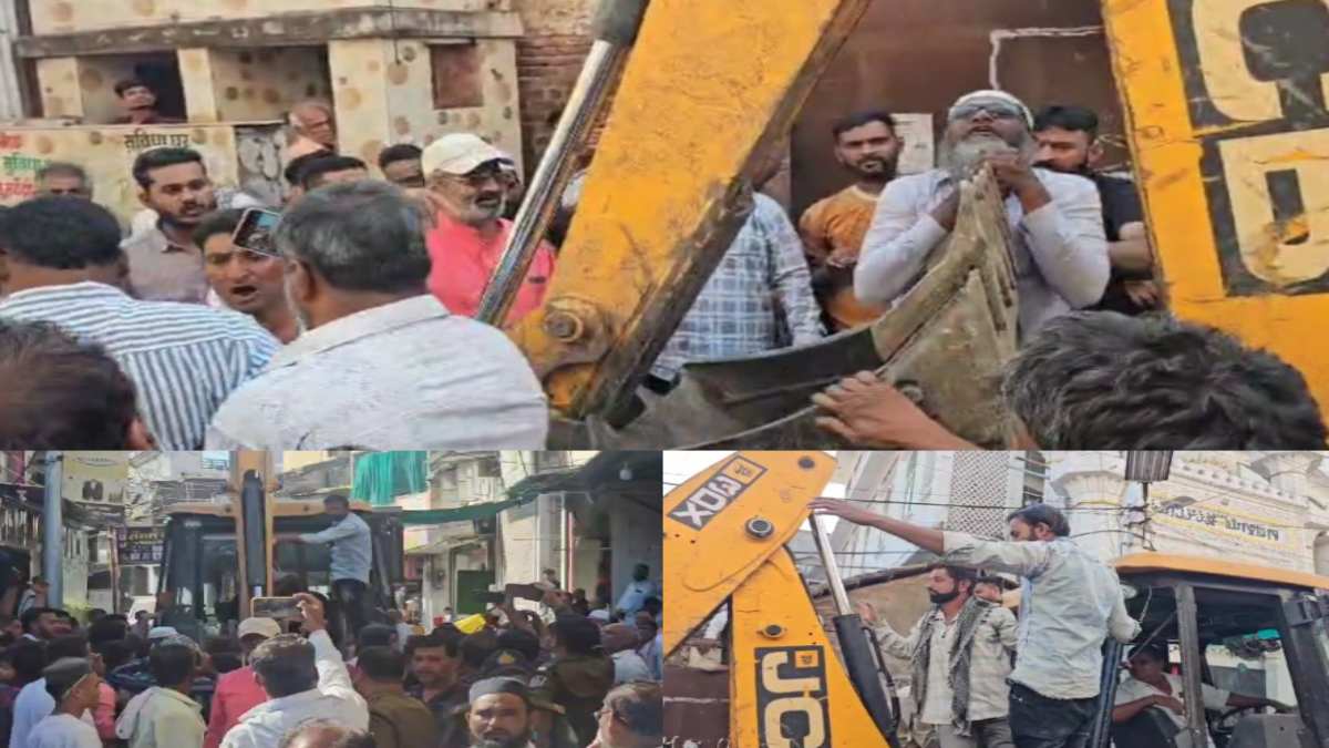 VIDEO : JCB पर चढ़े लोग, कांग्रेस पार्षद के साथ मिलकर लोगों ने किया हंगामा, मटन मार्केट हटाने पहुंची थी निगम की टीम