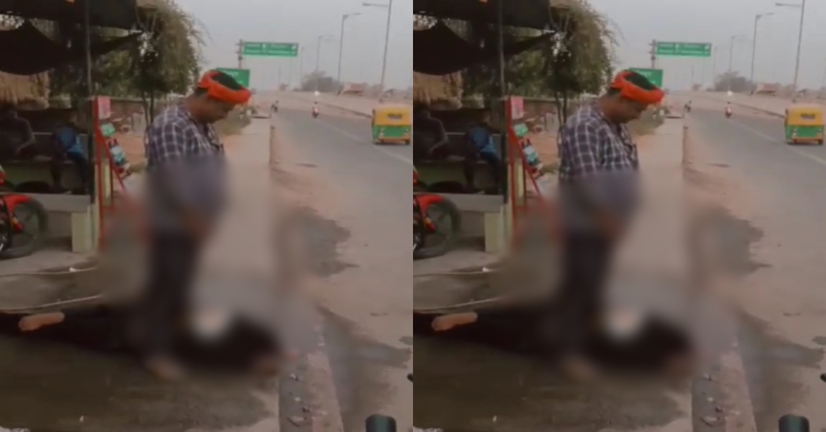 शर्मनाक! सड़क किनारे खुलेआम युवक पर पेशाब कर रहा शख्स, नशे की हालत में करने लगा अजीब हरकत, वीडियो वायरल
