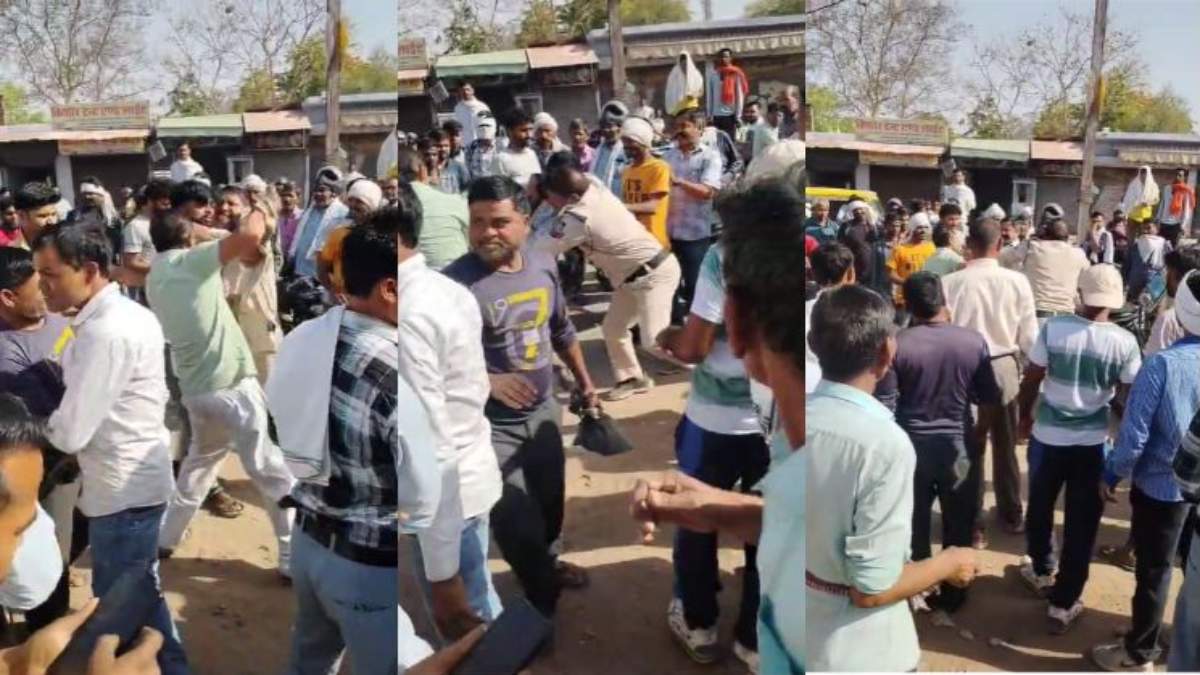 वर्दी की गर्मीः ई रिक्शा चालक के साथ पुलिसकर्मी ने बीच सड़क की मारपीट, वीडियो वायरल