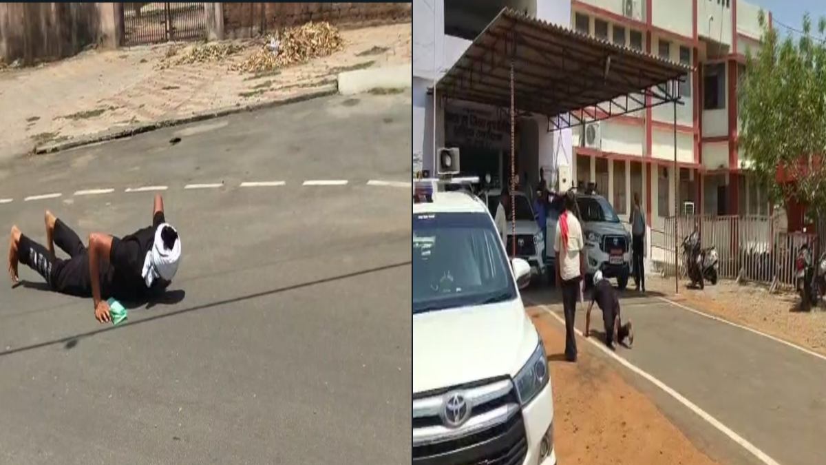 कुंभकरण की नींद सो रहा प्रशासन! चिलचिलाती धूप में जमीन पर लोटते हुए कलेक्ट्रेट पहुंचा युवक, जानें पूरा मामला