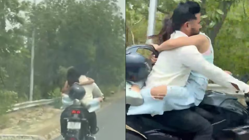 चलती बाइक पर इश्कबाजी पड़ी महंगी, नोएडा पुलिस ने काटा तगड़ा चालान; Video Viral