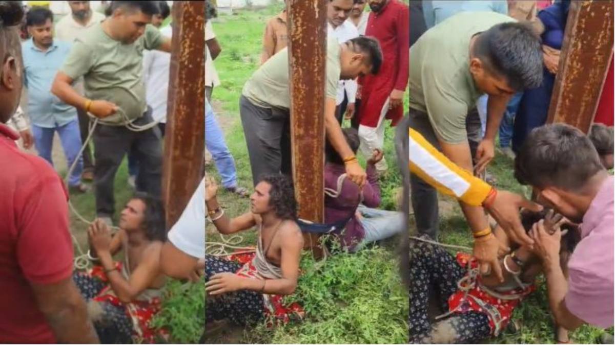 बच्चा चोरी के आरोप में 2 लोगों को खंभे से बांधकर पीटाः पुलिस बनी रही मूकदर्शक, वीडियो वायरल