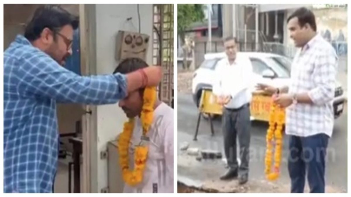 बिजली कटौती का अनोखा विरोध, माला पहनाकर लाइनमैन का ‘सम्मान’, इधर बदहाल सड़क पर माला चढ़ाकर अर्पित की श्रद्धांजलि, देखें Video  